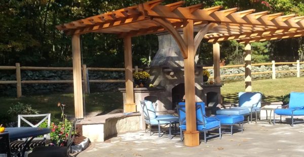 photo of an outdoor fireplace and living area