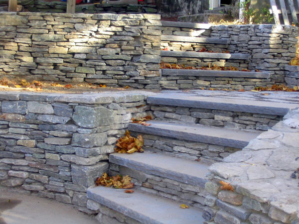 natural stone wall and stairs by Ideal Landscape of Holden MA