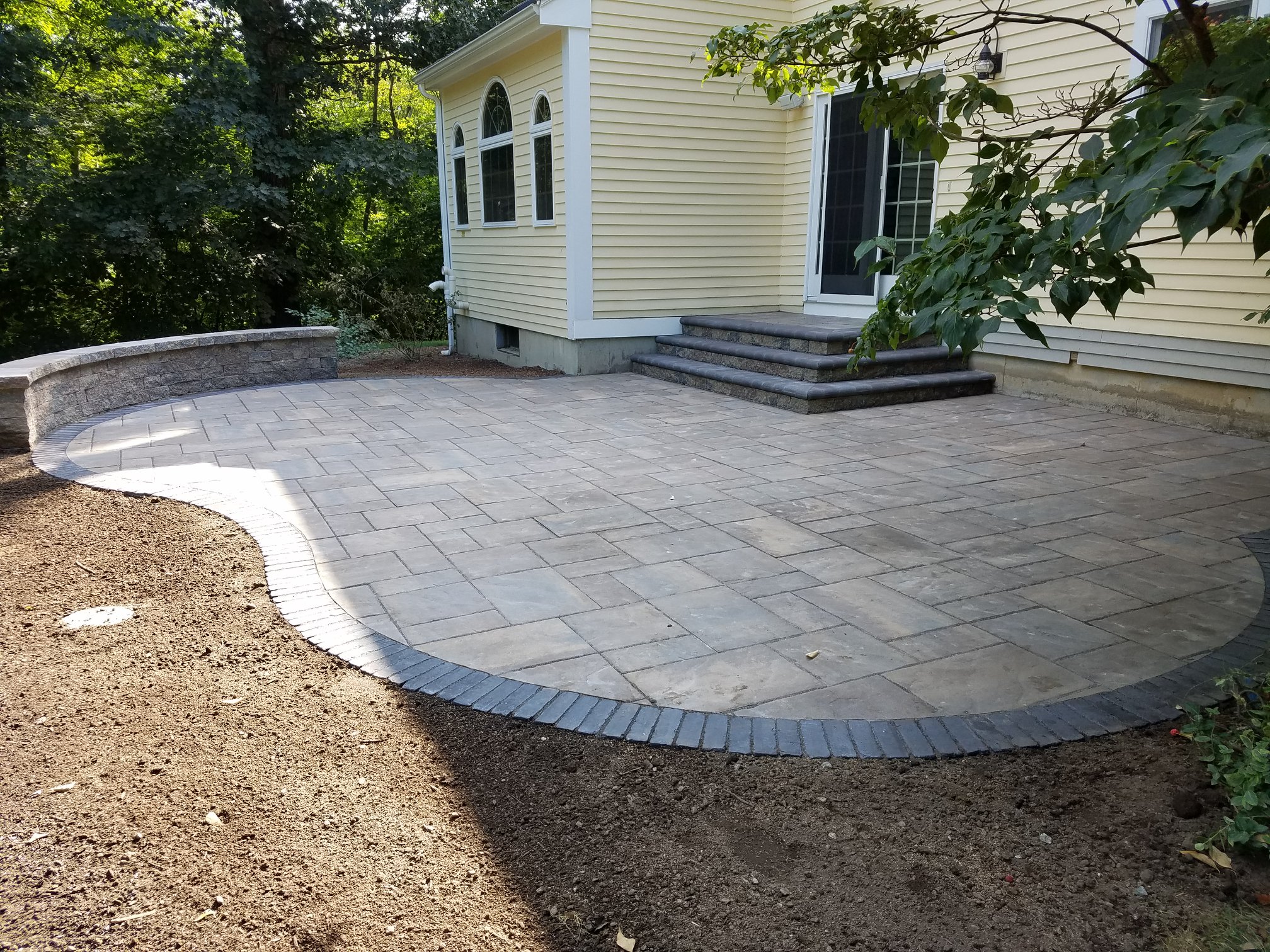 photo of a patio in West Boylston MA designed and installed by Ideal Landscape
