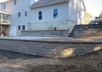 retaining wall and stairs project in Oxford MA by Ideal Landscape