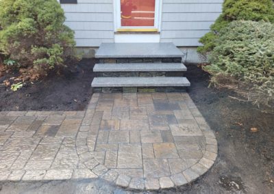 Oval landing/walkway and stairs in Sterling MA