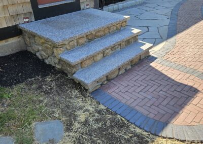 paver and bluestone walkway with granite steps in Leicester Massachusetts