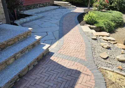 paver and bluestone walkway with granite steps in Leicester Massachusetts