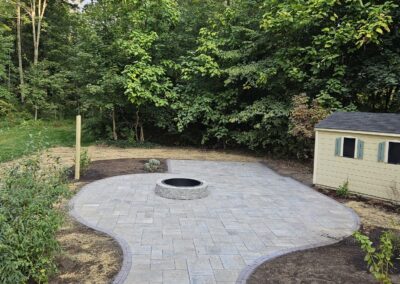 patio and fire pit in Princeton MA contracted by Ideal Landscape